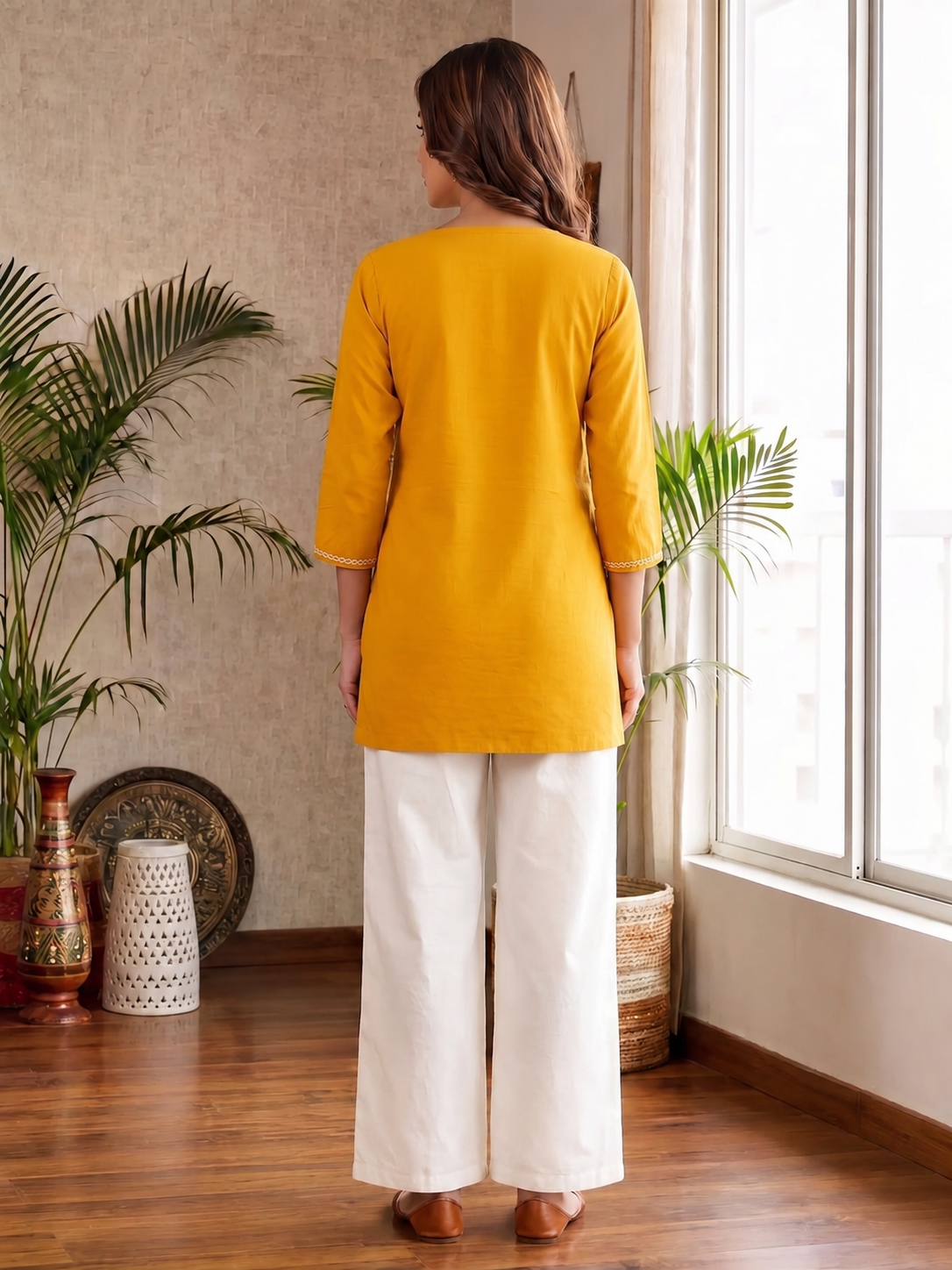 Yellow Embroidered Straight Kurti with Intricate White Floral Border