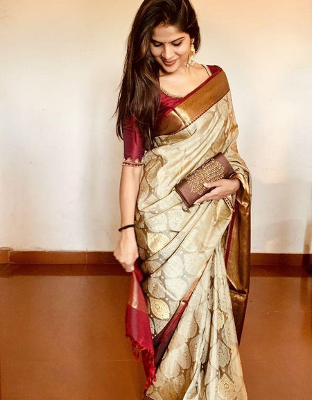 soft silk glorious Beige with Maroon woven saree casual wear